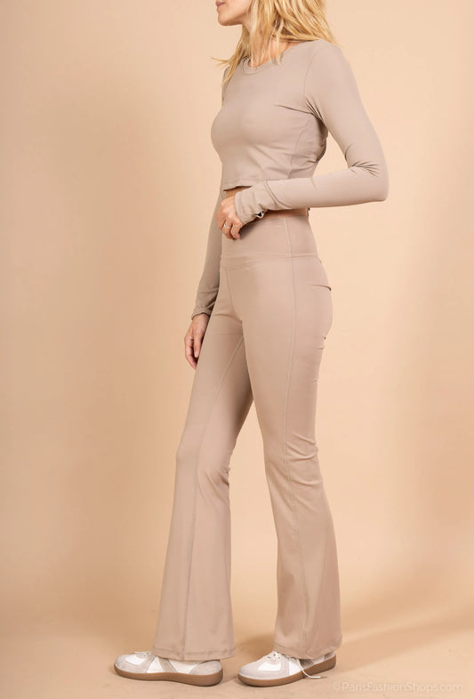 Long sleeve lace-up back top and flared pants set, sporty chic style