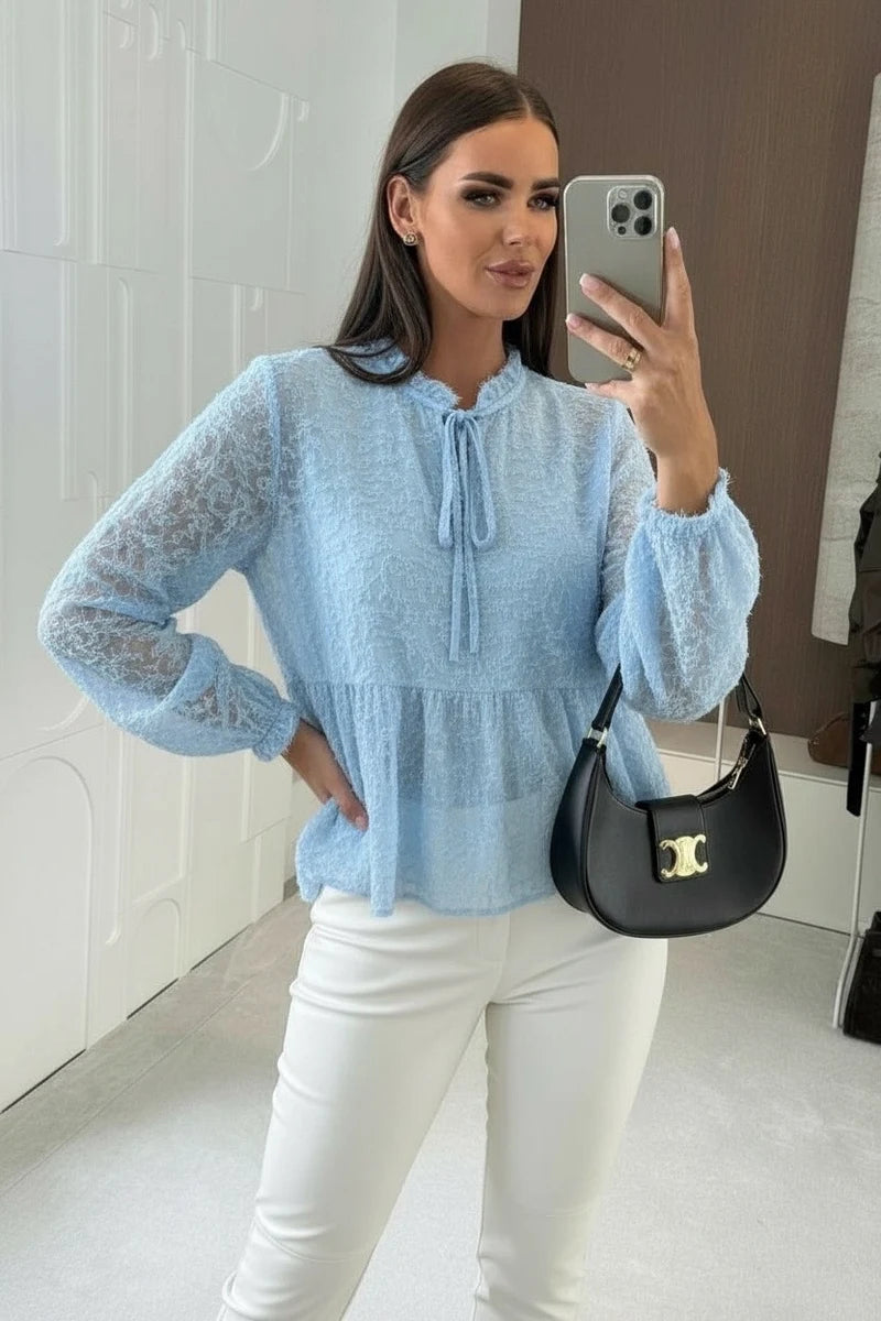 Fluffy textured blouse with tie collar