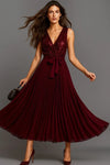 Long elegant dress with slit and jeweled belt