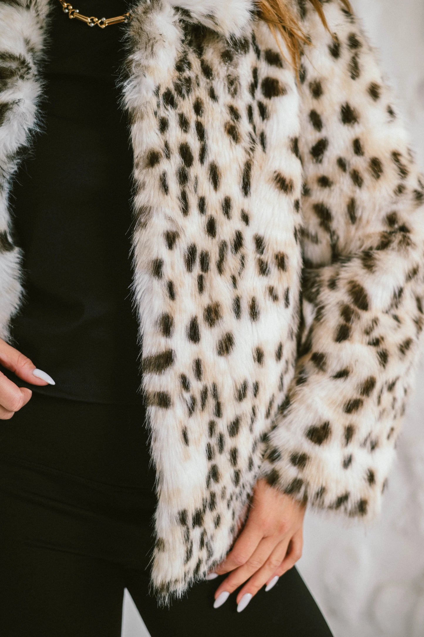 RAVEN – Short jacket in printed faux fur