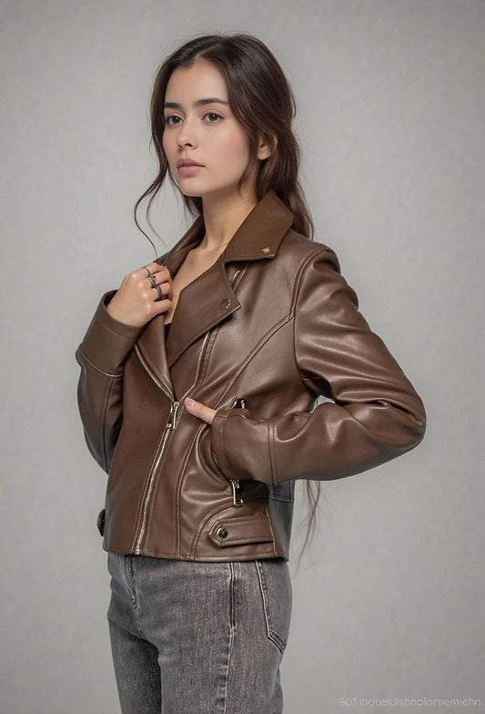 Smooth faux leather jacket, cropped cut, notched collar, and silver zips for a bold look.