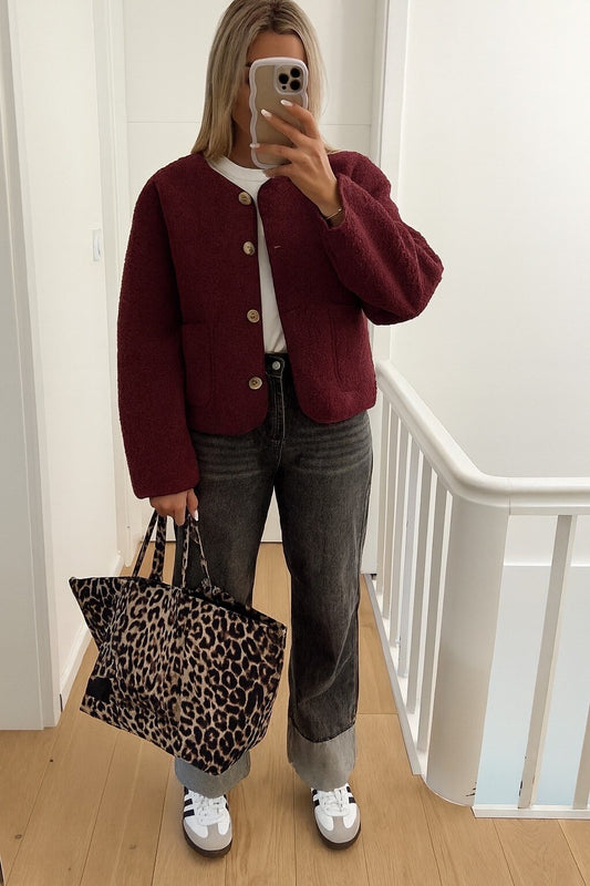 Buttoned varsity jacket with pockets