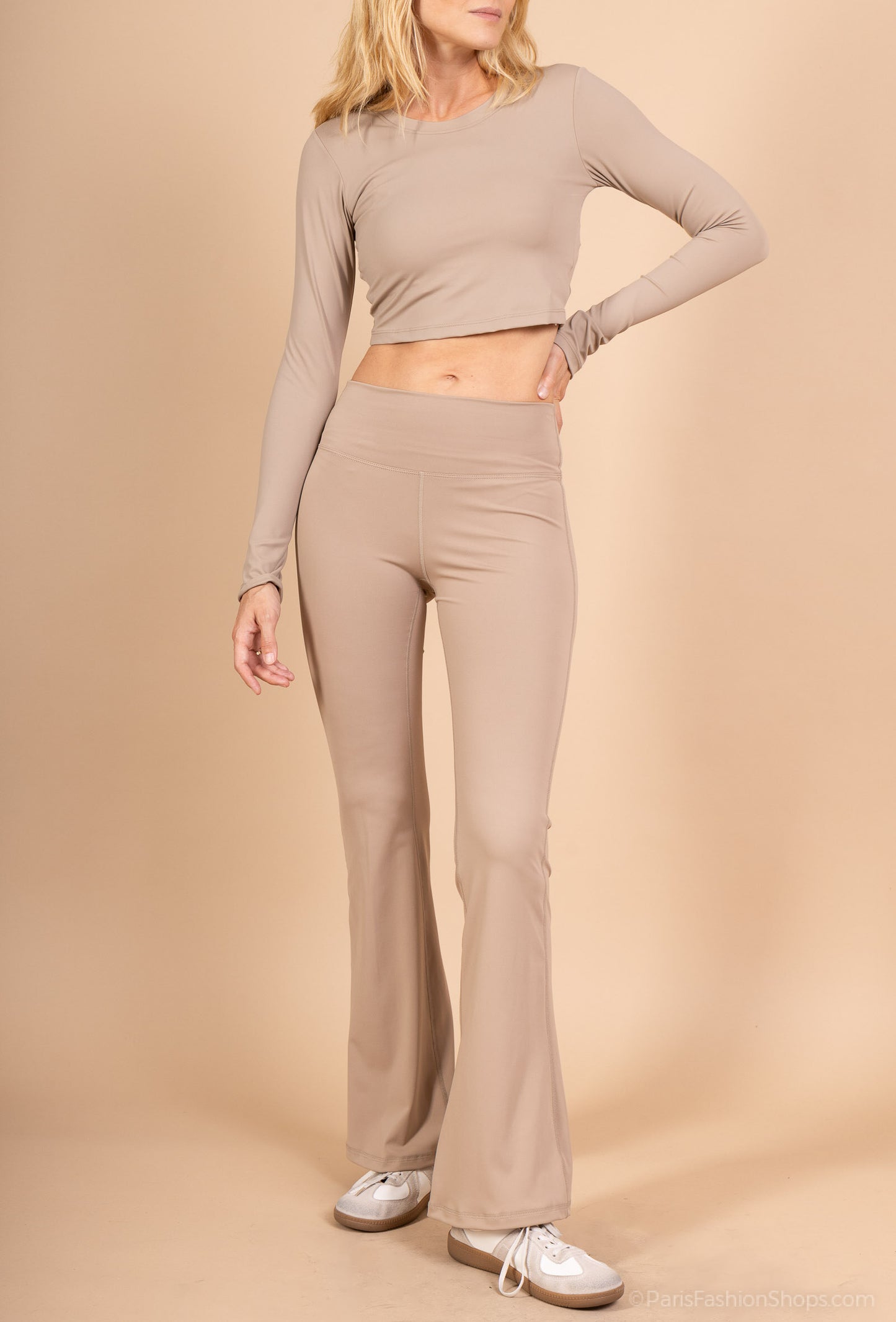 Long sleeve lace-up back top and flared pants set, sporty chic style