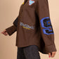 Trendy streetwear oversized shirt with embroidered patches
