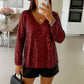 Long-sleeved sequin V-neck blouse