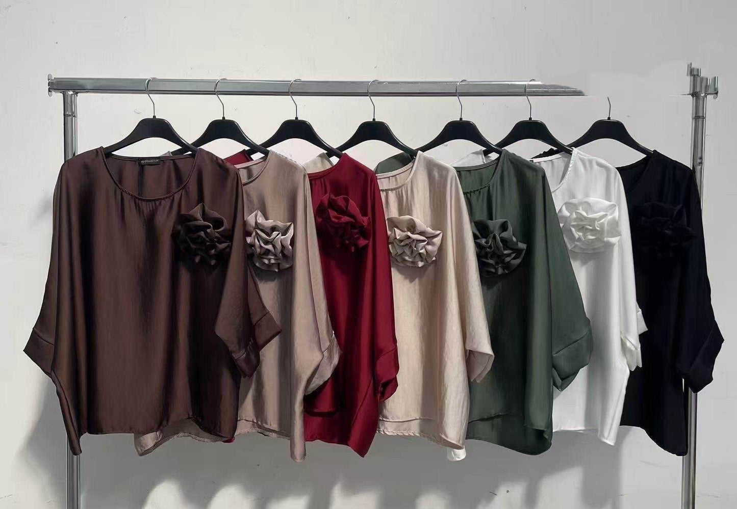 Satin blouse with flower