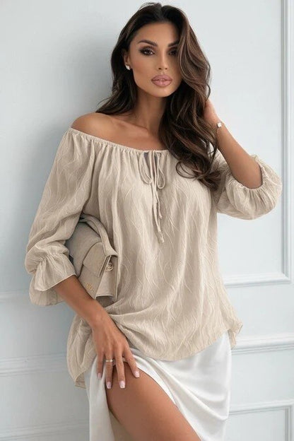 Textured off-shoulder blouse with ruffled sleeves