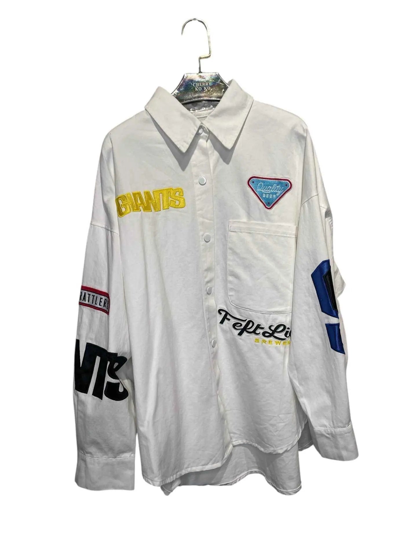 Trendy streetwear oversized shirt with embroidered patches