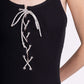 Ribbed jumpsuit with straps and rhinestone lacing