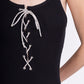 Ribbed jumpsuit with straps and rhinestone lacing