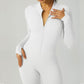Ribbed zip-up jumpsuit with long sleeves and high collar