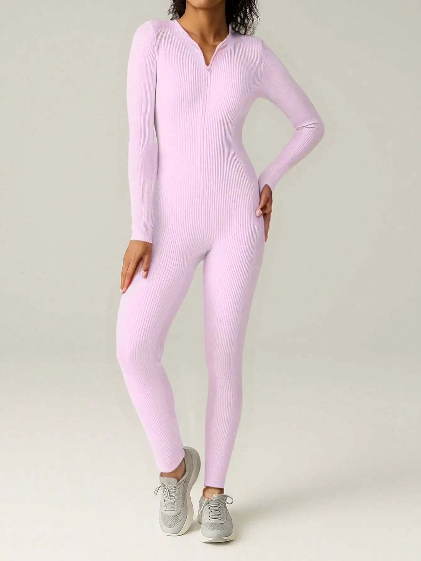 Ribbed zip-up jumpsuit with long sleeves and high collar