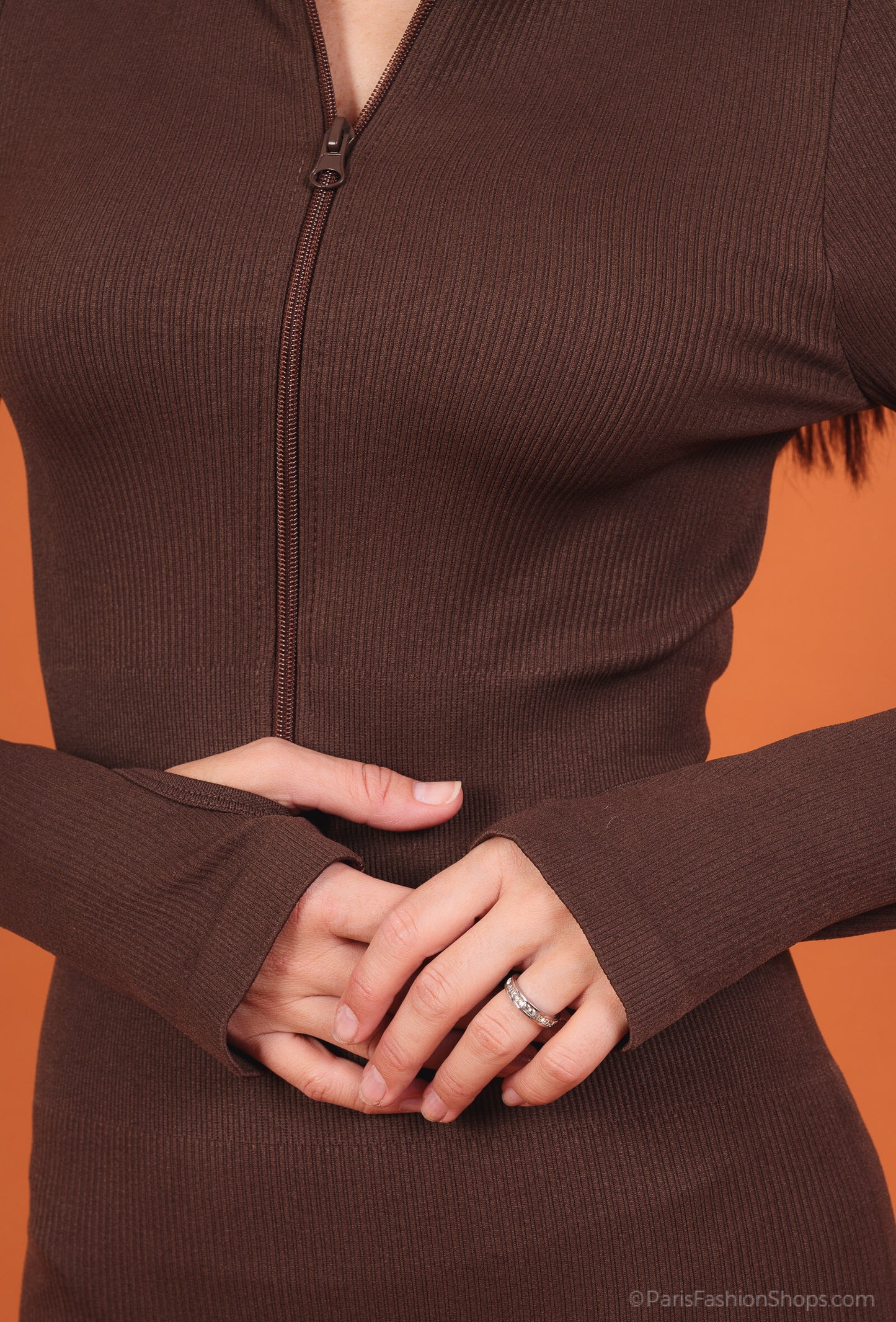 Ribbed zip-up jumpsuit with long sleeves and high collar