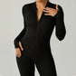 Ribbed zip-up jumpsuit with long sleeves and high collar