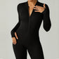 Ribbed zip-up jumpsuit with long sleeves and high collar