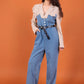 Two-tone denim jumpsuit with integrated blouse effect and belt