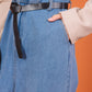 Two-tone denim jumpsuit with integrated blouse effect and belt