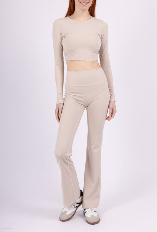 Long sleeve lace-up back top and flared pants set, sporty chic style