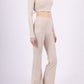Long sleeve lace-up back top and flared pants set, sporty chic style