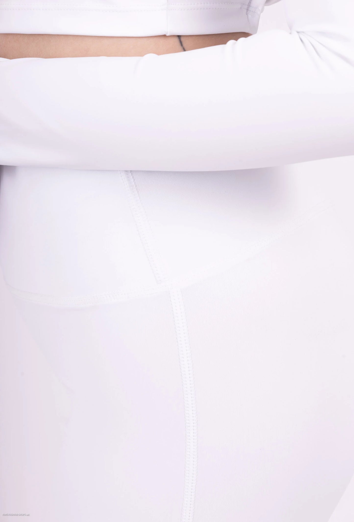 Long sleeve lace-up back top and flared pants set, sporty chic style