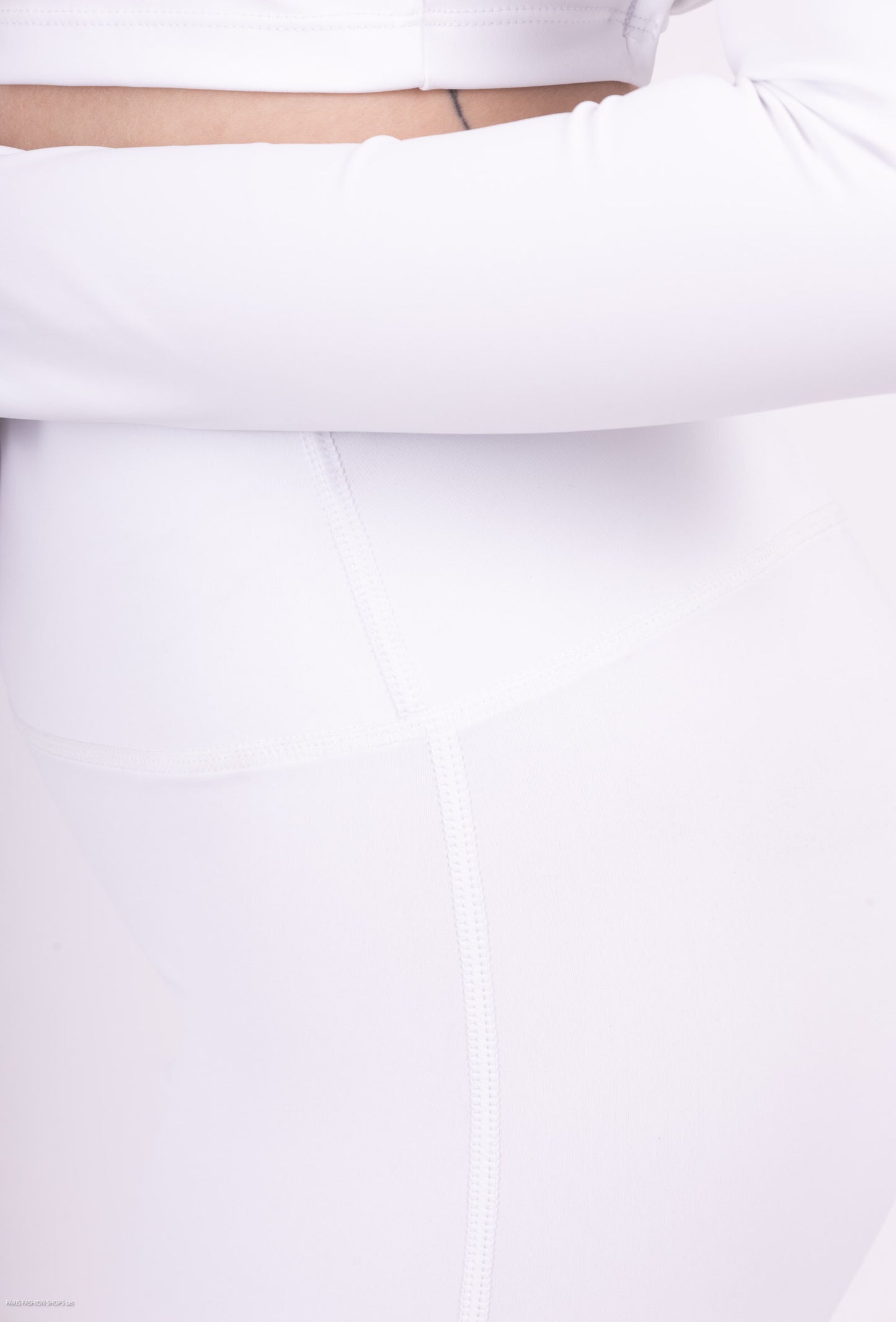 Long sleeve lace-up back top and flared pants set, sporty chic style