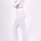 Long sleeve lace-up back top and flared pants set, sporty chic style