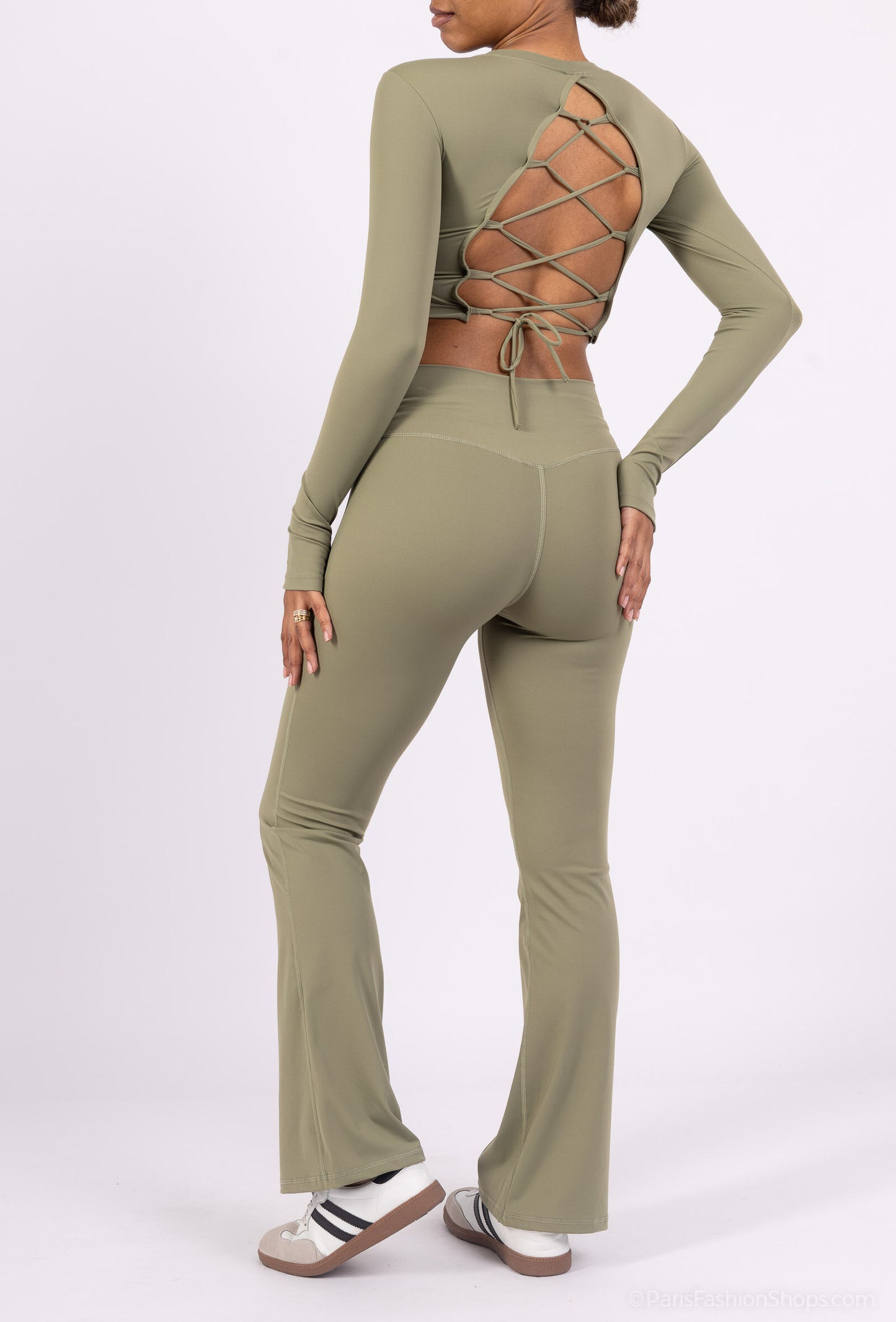 Long sleeve lace-up back top and flared pants set, sporty chic style