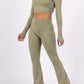 Long sleeve lace-up back top and flared pants set, sporty chic style