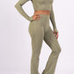 Long sleeve lace-up back top and flared pants set, sporty chic style