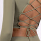 Long sleeve lace-up back top and flared pants set, sporty chic style