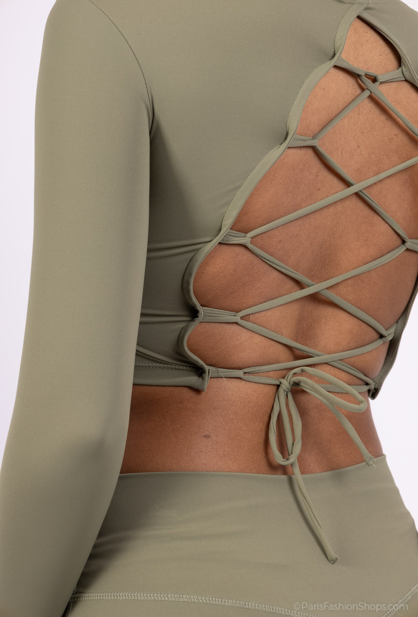 Long sleeve lace-up back top and flared pants set, sporty chic style