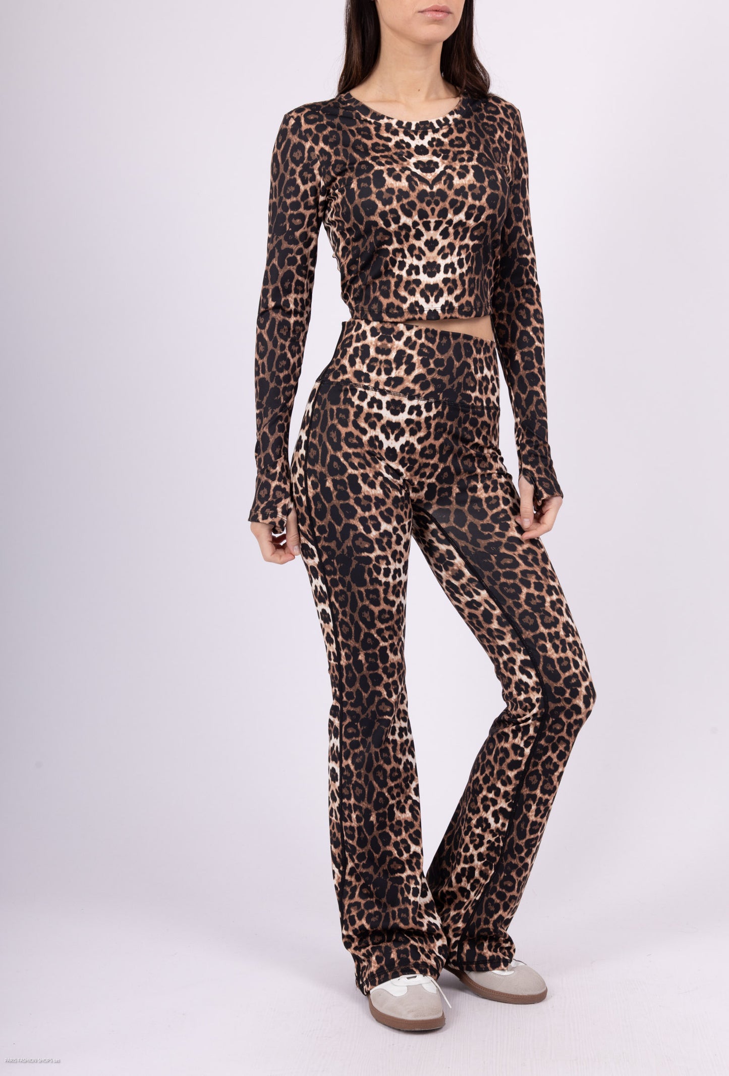 Long sleeve lace-up back top and flared pants set, sporty chic style