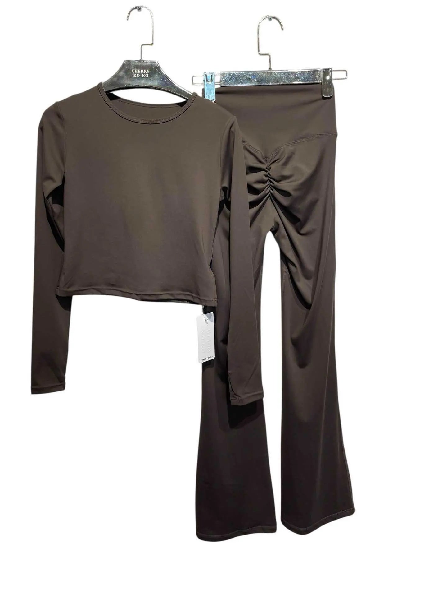 Women's high-waisted flare sports set with long sleeves and shaping fabric