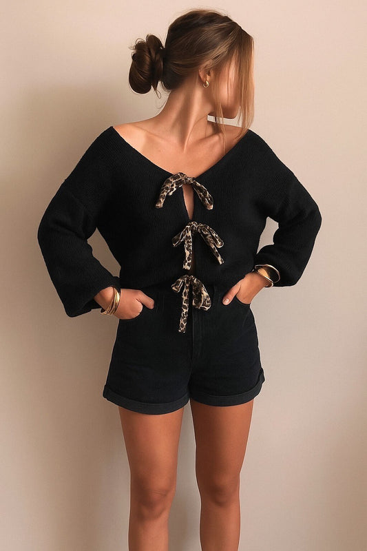 Vest with leopard knots