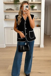 Boucle effect sleeveless vest with pockets and gold buttons