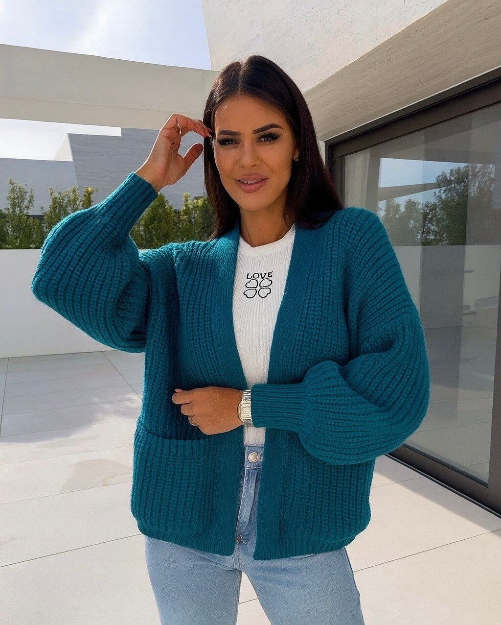 Open vest with knitting pockets