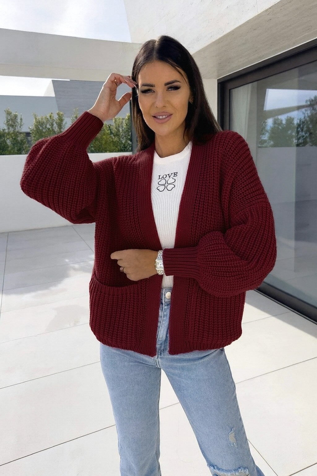 Open vest with knitting pockets