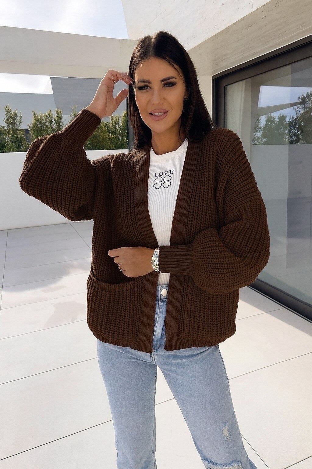 Open vest with knitting pockets