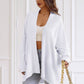 Oversized open cardigan with gold button sleeve pockets