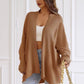Oversized open cardigan with gold button sleeve pockets