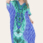 Long caftan with vibrant green geometric print, cinched waist, and adjustable silhouette Ref-7031-L