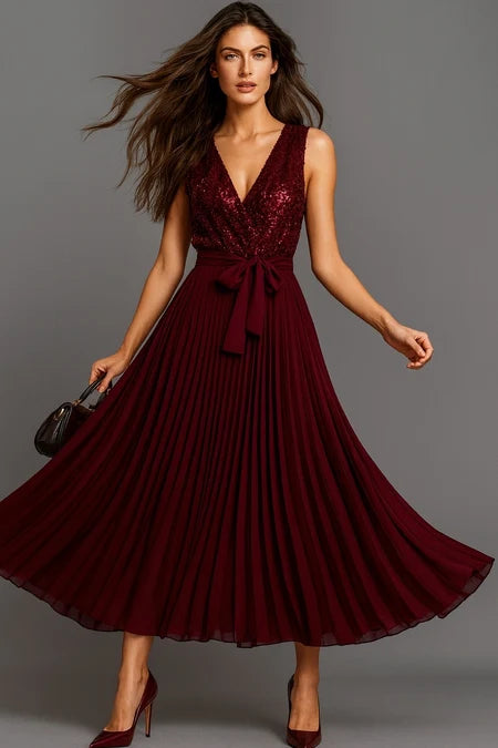 Long elegant dress with slit and jeweled belt