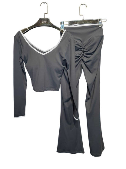 LYANA – Crossed top and flared pants set with contrasting details