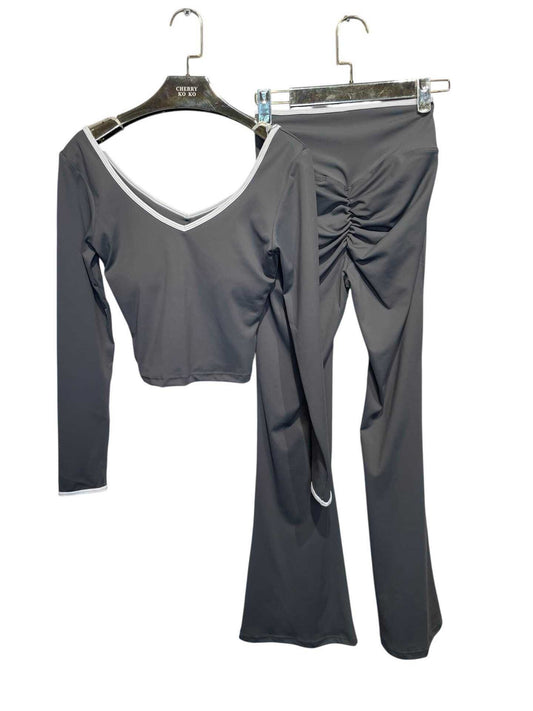 LYANA – Crossed top and flared pants set with contrasting details