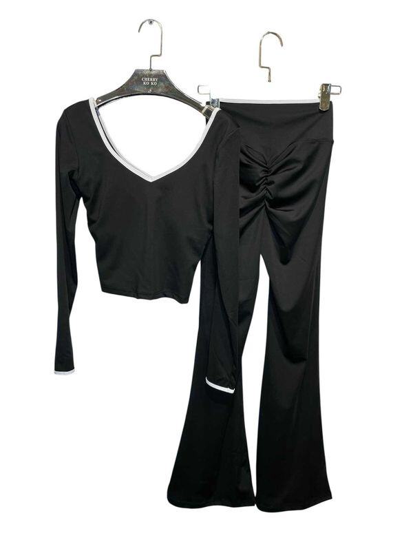 LYANA – Crossed top and flared pants set with contrasting details