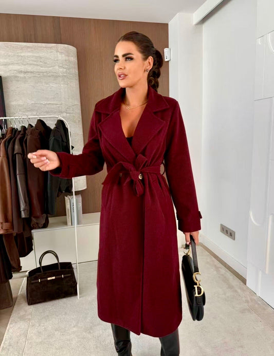 Coat with lining and textured material belt