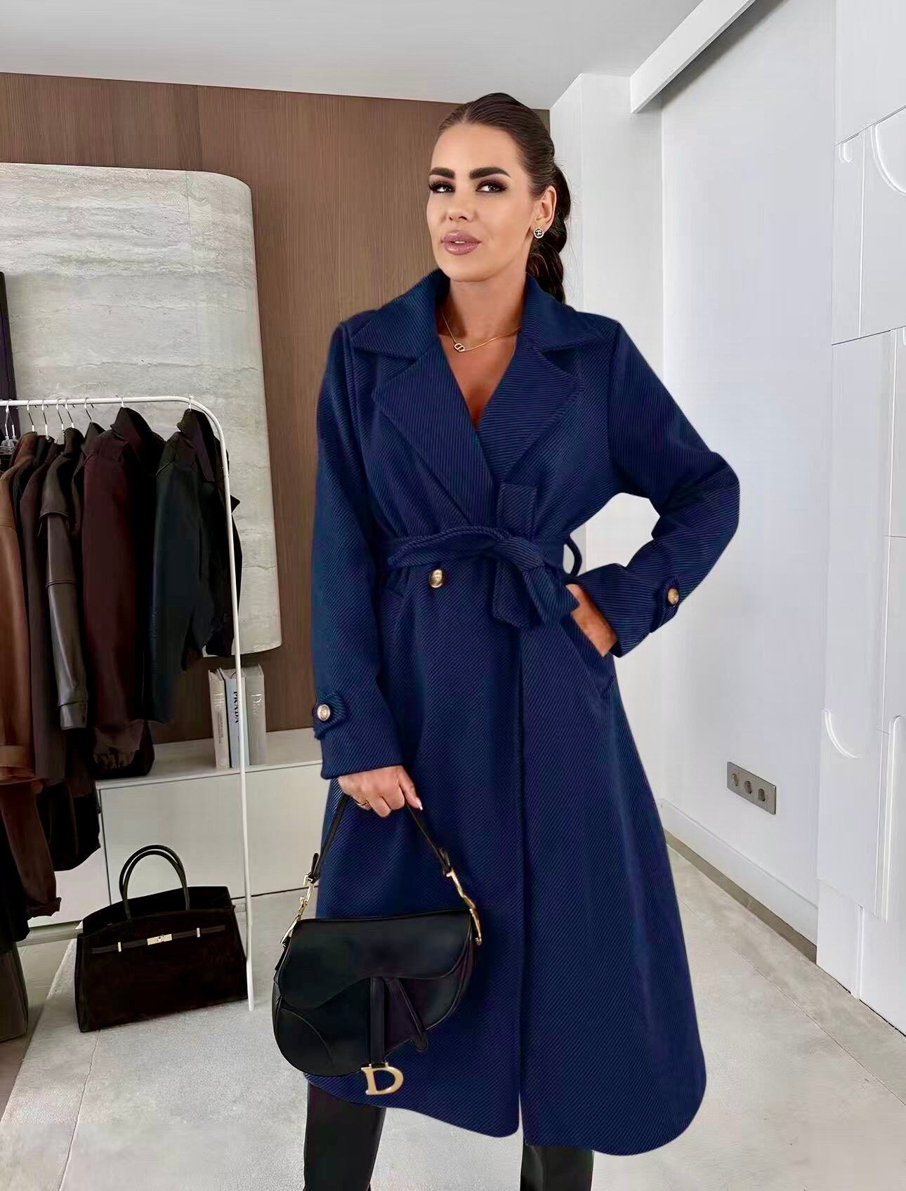 Coat with lining and textured material belt