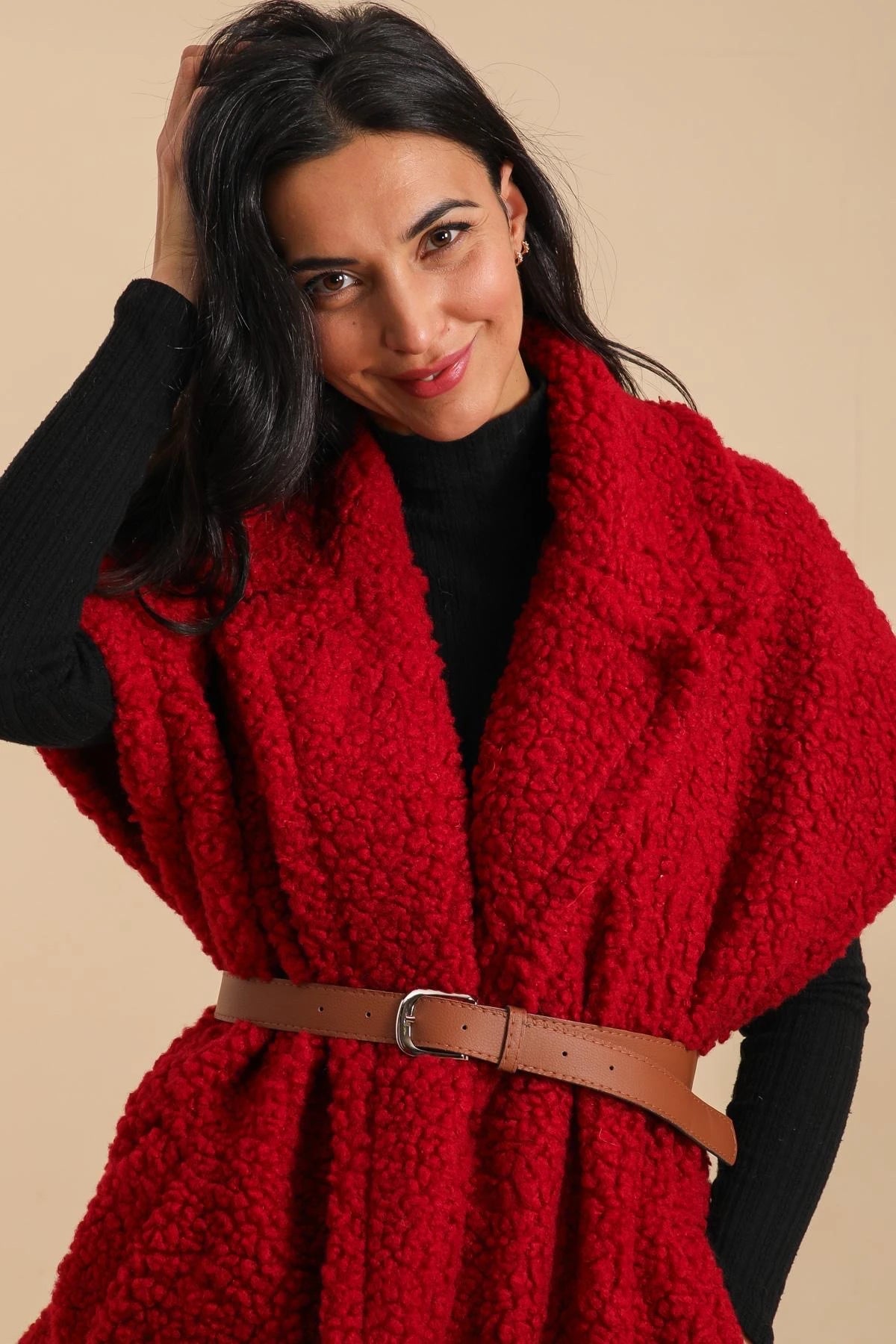 Mid-length sheepskin coat with belt and lining