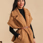 Mid-length sheepskin coat with belt and lining