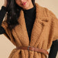 Mid-length sheepskin coat with belt and lining